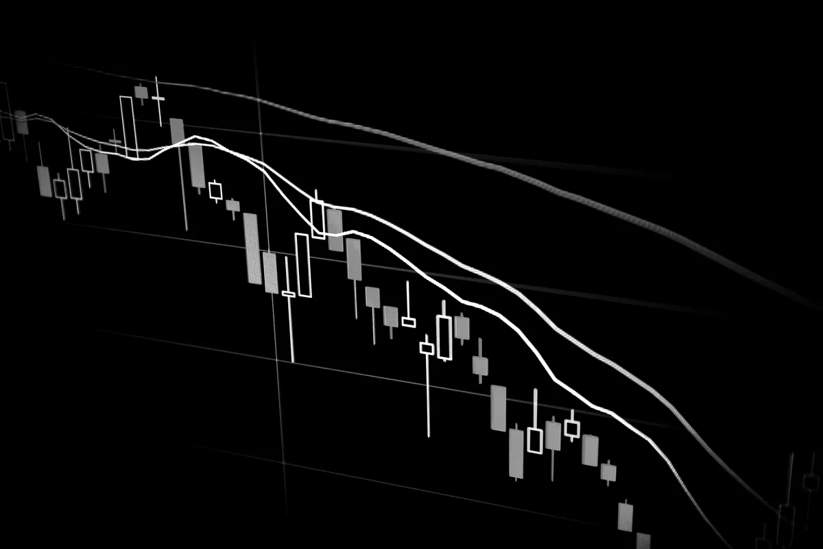 Financial data on a dark screen